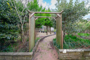 lea road garden archway into more garden, lancashire estate agent property