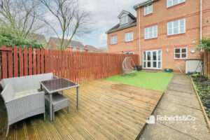 woodcock close back garden sitting area from roberts letting agents bamber bridge