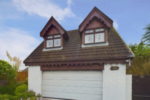 garage and home exterior, property in Leyland